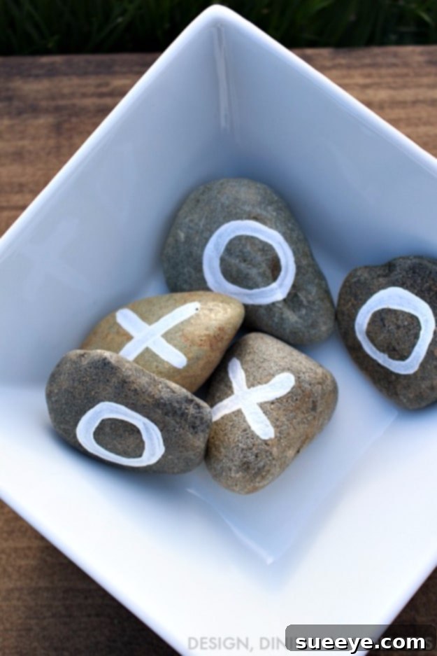 Outdoor Tic Tac Toe Game - Backyard Entertainment Large outdoor tic-tac-toe game made from scrap wood and painted rocks