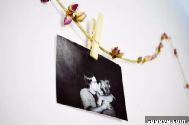 Dreamy Rosebud Garland: Romantic and whimsical photo display Romantic Dreamy Rosebud Garland adorned with small photographs