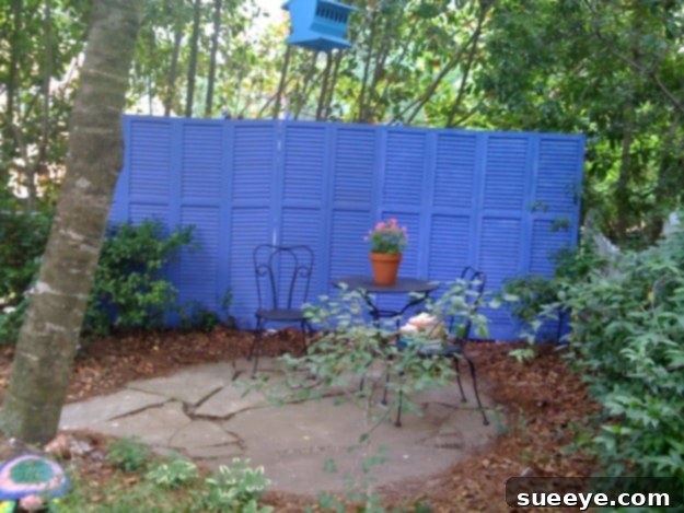 Re-purposed Shutter Fence Idea Upcycled re-purposed shutter fence for unique garden decor