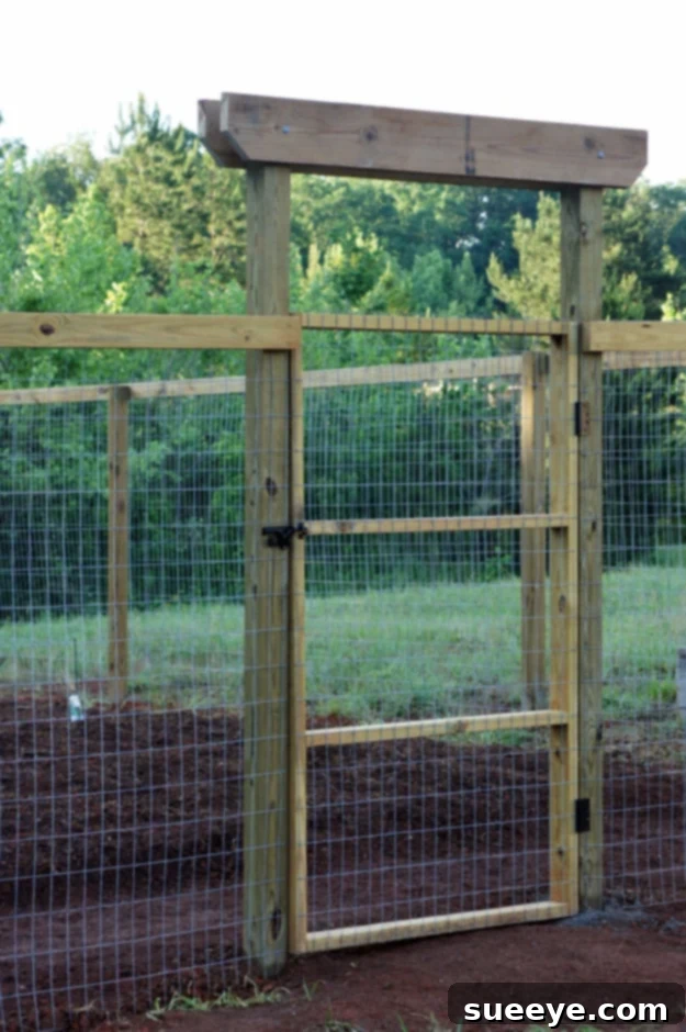 DIY Mesh Backyard Gate For Pets Secure DIY mesh backyard gate for pet containment