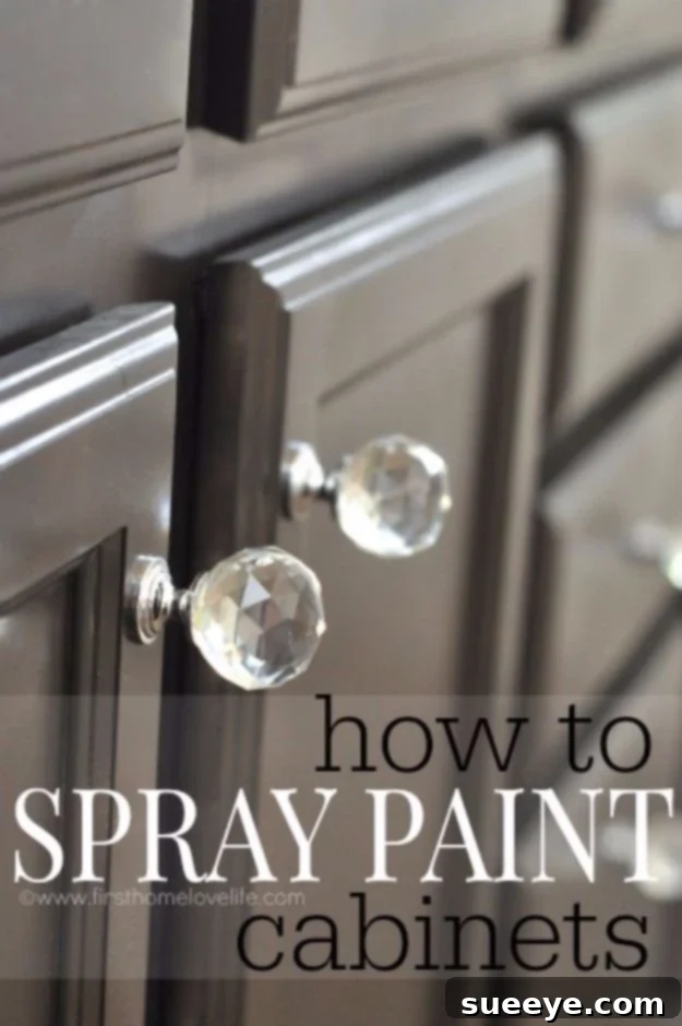 Spray Painting Cabinets: Kitchen & Bath Makeover Kitchen cabinets beautifully updated with a fresh coat of spray paint for a modern and clean aesthetic