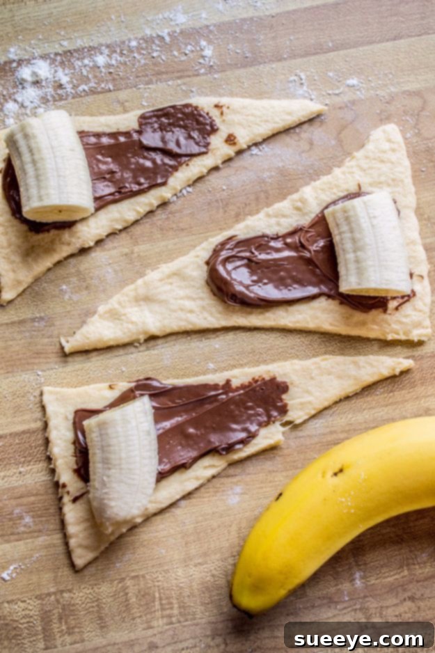 Nutella and Banana Stuffed Crescent Rolls Delicious Nutella and Banana Stuffed Crescent Rolls, a sweet and easy dessert or breakfast treat.