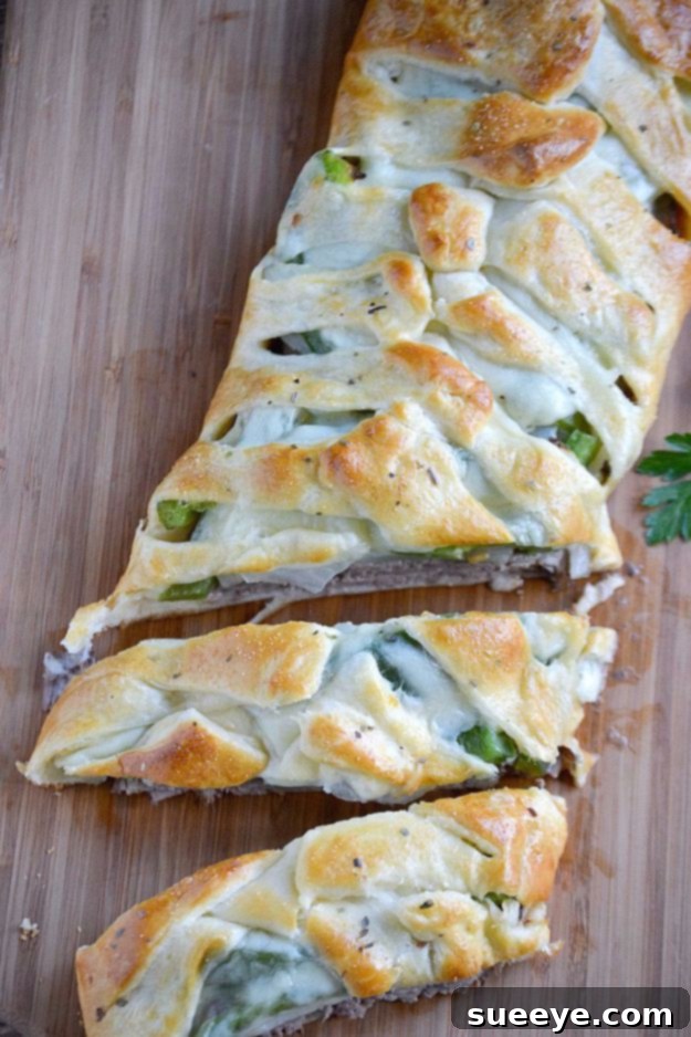 Philly Cheesesteak Crescent Braid Savory Philly Cheesesteak Crescent Braid, a delicious and hearty dinner.