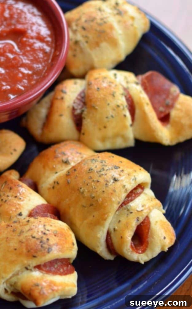 Mozzarella Pepperoni Croissants Kid-friendly Mozzarella Pepperoni Croissants using crescent rolls, a simple and quick meal.