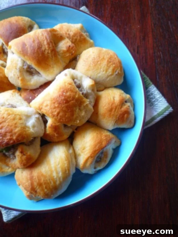 Sausage and Cream Cheese Crescents Savory Sausage and Cream Cheese Crescents, a hearty breakfast or brunch idea.