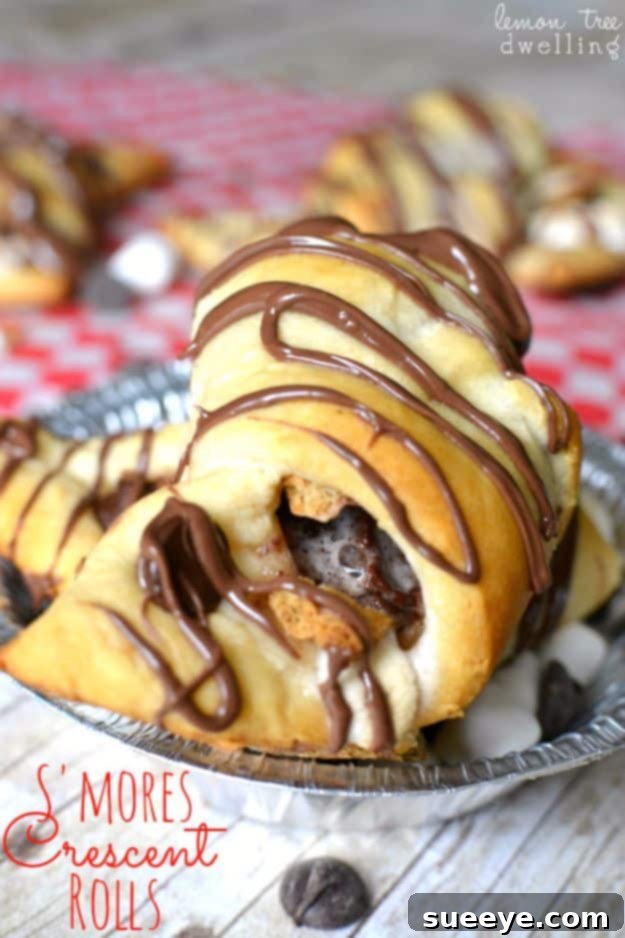 S'mores Crescent Rolls Indoor S'mores Crescent Rolls with melted chocolate and gooey marshmallows.