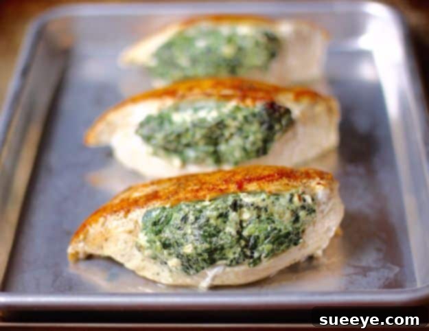 Cooked Spinach Stuffed Chicken Breasts sliced