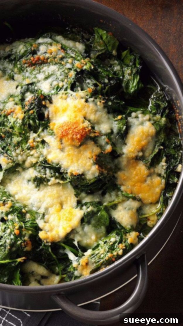 Golden brown Spinach Parm Casserole in a baking dish
