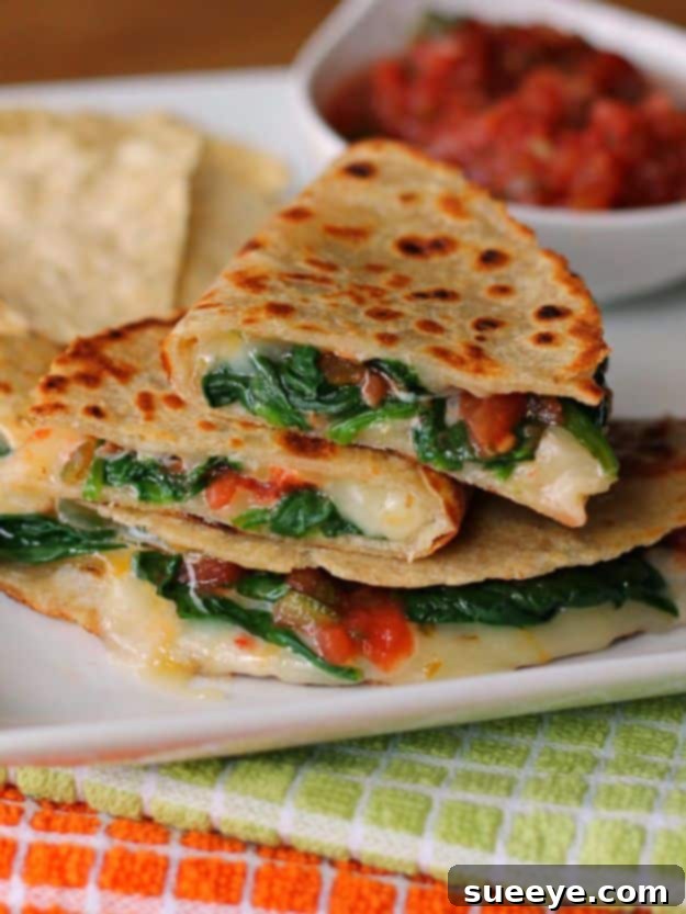 Spicy Spinach Quesadillas cut into wedges