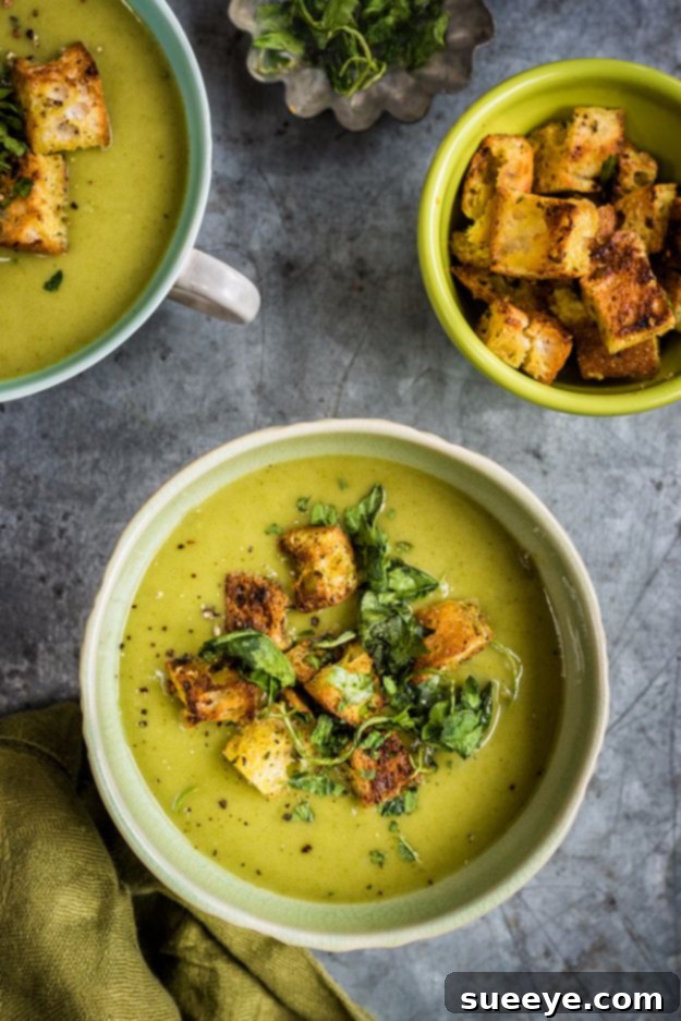 A bowl of creamy Spinach Coconut and Zucchini Soup