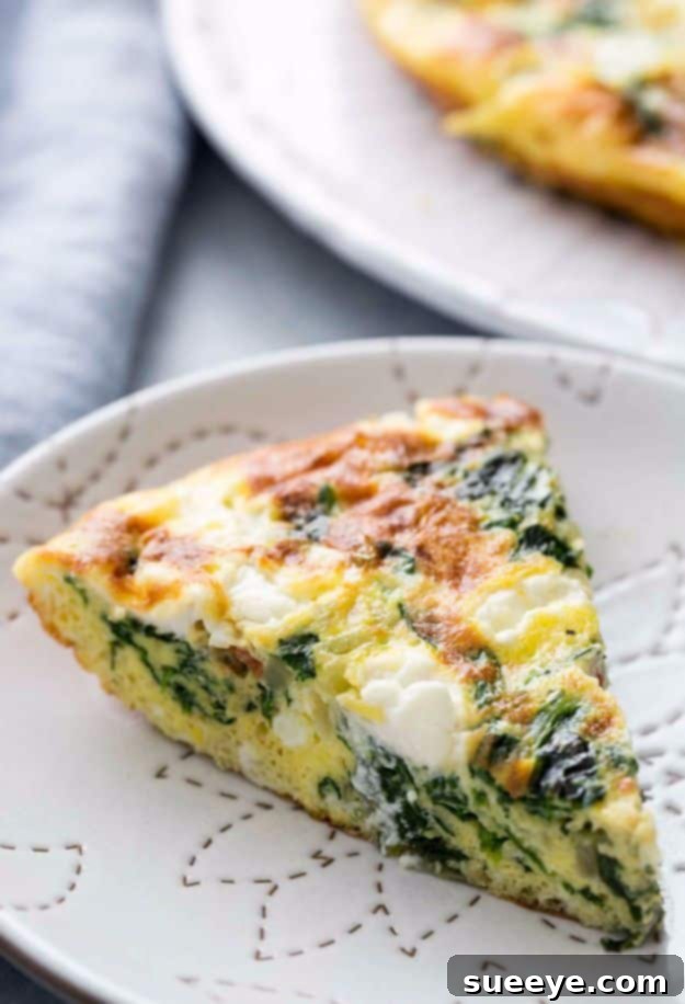 A slice of Spinach Frittata on a plate