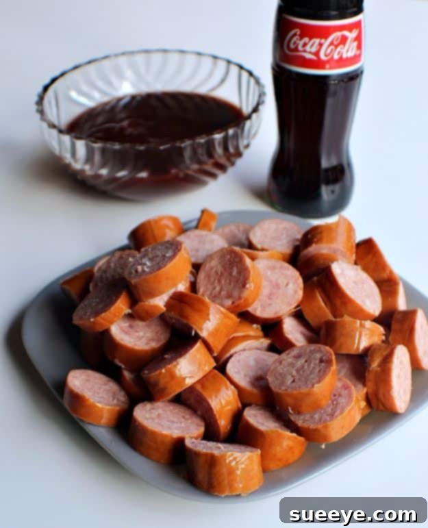 Best Coca Cola Recipes - Coca Cola Slow Cooker BBQ Kielbasa - Make Awesome Coke Chicken, Coca Cola Cake, Meatballs, Sodas, Drinks, Sweets, Dinners, Meat, Slow Cooker and Recipe Ideas #cocacola #recipes #desserts Best Coca Cola Recipes - Coca Cola Slow Cooker BBQ Kielbasa - Make Awesome Coke Chicken, Coca Cola Cake, Meatballs, Sodas, Drinks, Sweets, Dinners, Meat, Slow Cooker and Recipe Ideas #cocacola #recipes #desserts