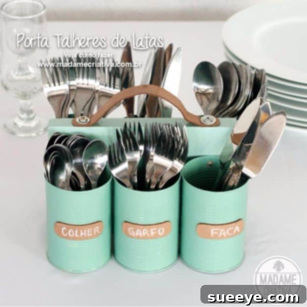 Craft a beautiful and practical DIY Tin Can Cutlery Holder to keep your kitchen neat and add a touch of farmhouse charm. DIY Tin Can Cutlery Holder for rustic kitchen decor and organization