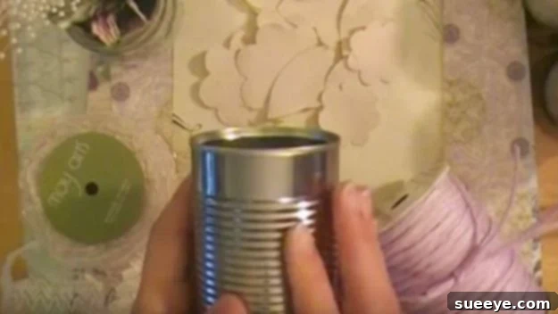Embellish tin cans with various materials to create beautiful Decorated Tin Cans for any purpose. Decorated Tin Cans for decorative storage and home accents