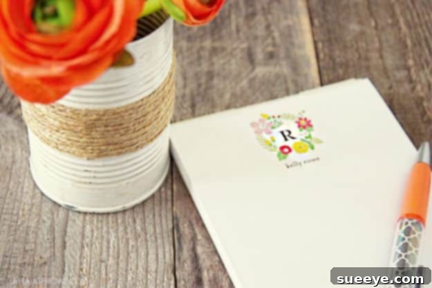 Craft a charming Rustic Twine Wrapped Vase from a tin can for a beautiful, natural centerpiece or accent. Rustic Twine Wrapped Vase made from a recycled tin can