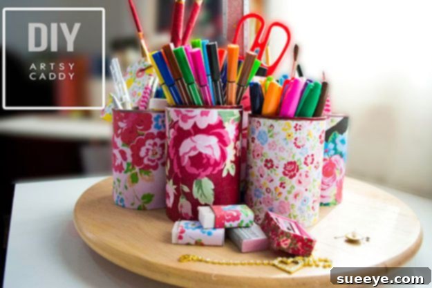 Organize your art and craft supplies with a practical and stylish DIY Artsy Caddy made from tin cans. DIY Artsy Caddy from tin cans for organizing craft supplies