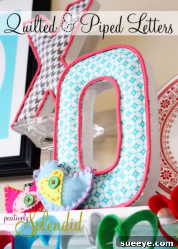 Colorful quilted letter with piping, made from fabric scraps, ideal for personalized room decor.
