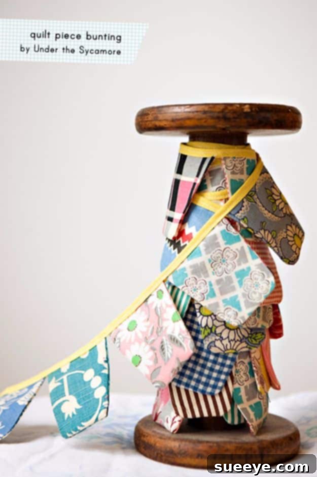 Decorative bunting made from unique quilt fabric pieces, perfect for party or room decor.