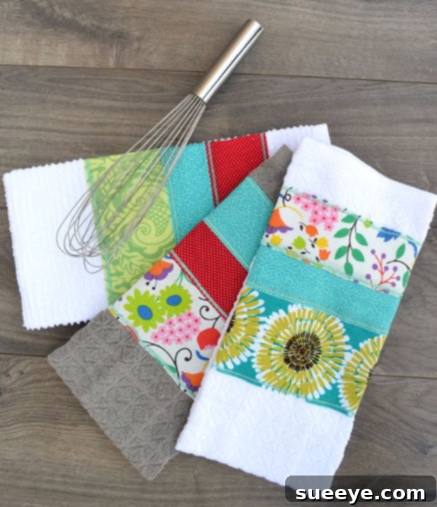 Kitchen dish towel with a decorative border made from a colorful array of fabric scraps.