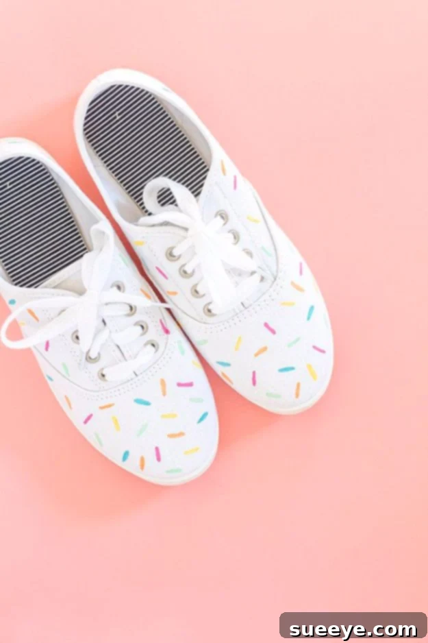DIY Painted Ice Cream Sprinkles Shoes: A playful and easy way to customize your sneakers with fabric paint. Close-up of white canvas sneakers custom-painted with colorful ice cream sprinkles, perfect for a fun DIY shoe makeover.