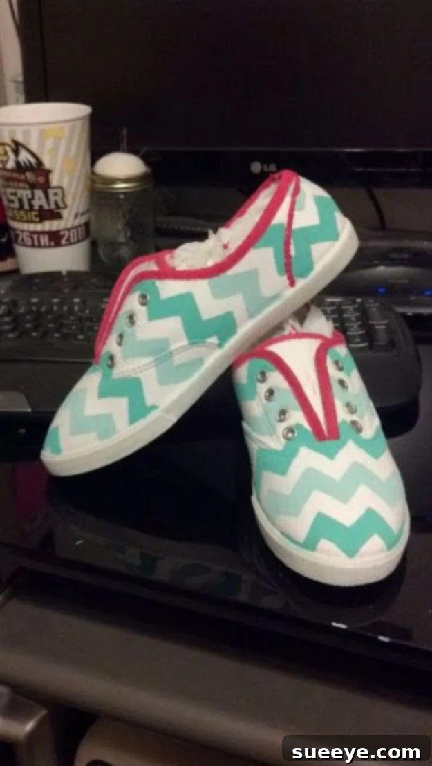 DIY Chevron Canvas Shoes: Achieve a chic, geometric look with easy taping and painting techniques. Stylish canvas sneakers featuring a bold and modern chevron pattern in contrasting colors.