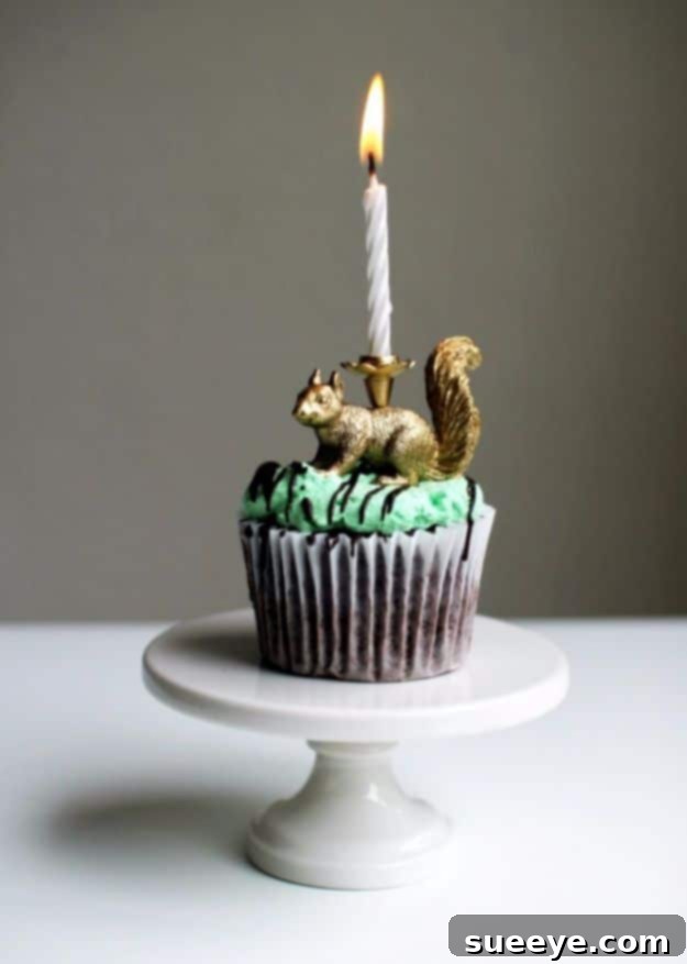 Whimsical DIY party animal candles featuring miniature figurines for a playful touch.