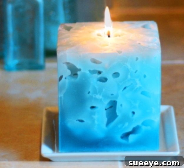 Unique ice candle with a distinctive porous texture, created using ice during pouring.