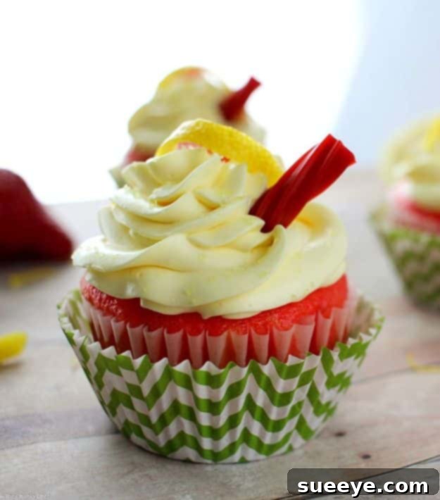 Sweet and Tart Strawberry Lemonade Cupcakes - A Summer Delight Refreshing Strawberry Lemonade Cupcakes with Tangy Frosting