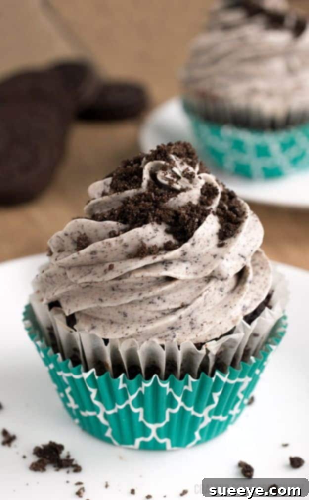 Rich Oreo Cream Cheese Frosting - A Cookie Lover's Dream Decadent Oreo Cream Cheese Frosting on Cupcakes
