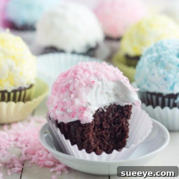 Winter Wonderland Snowball Cupcakes - Festive and Delicious Delicate Snowball Cupcakes Coated in Coconut Flakes