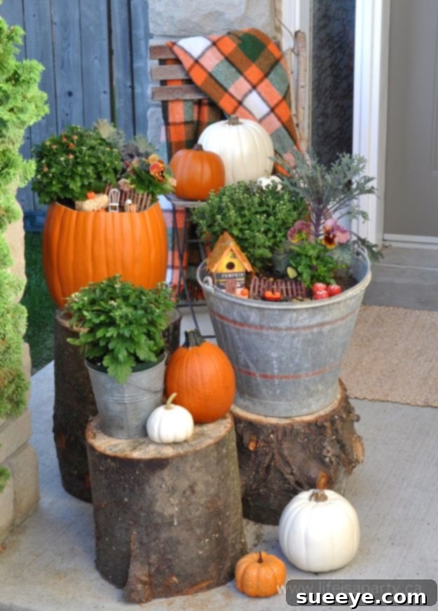 Fall Fairy Garden Miniature fall fairy garden in a pumpkin container with doll furniture