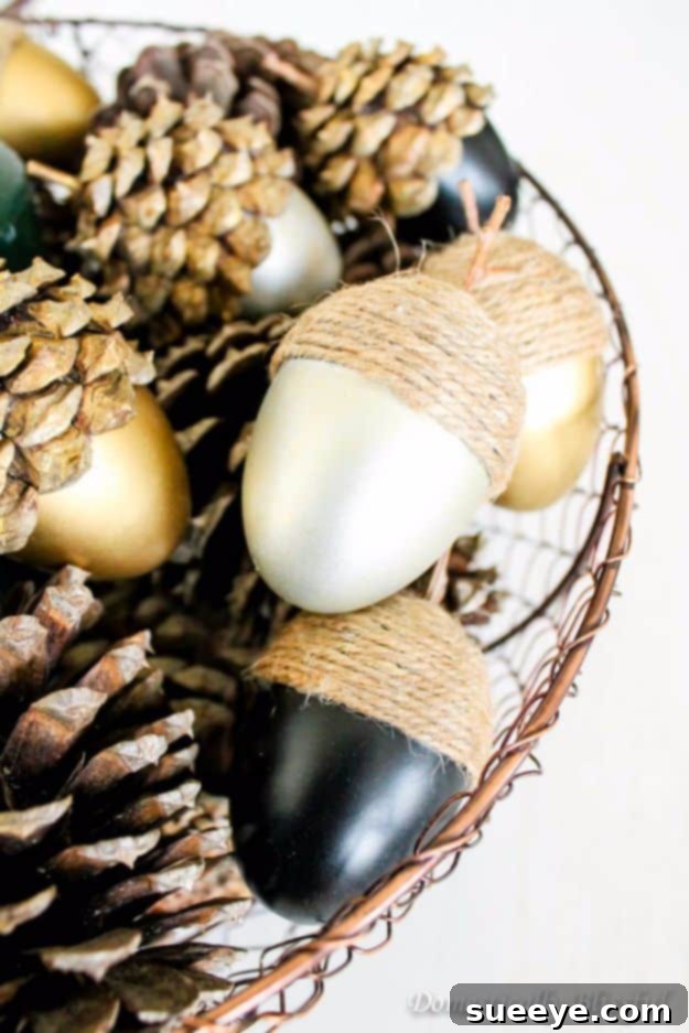 DIY Fall Acorns Decorative acorns made from plastic eggs wrapped in twine and embellished