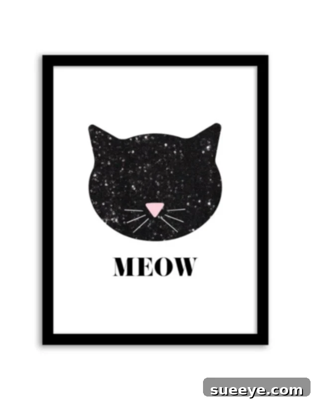 DIY Sequin Cat Wall Art Sparkling sequin cat wall art on a black canvas