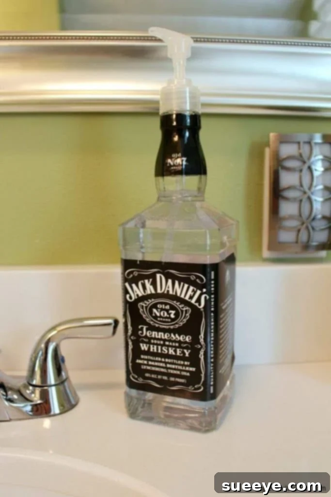 Repurposed Jack Daniels bottle as a stylish soap dispenser, a cool man cave decor DIY gift.