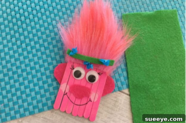 Trolls Poppy craft for kids, fun for movie fans DIY Trolls Poppy craft for boys, made with popsicle sticks and bright colors