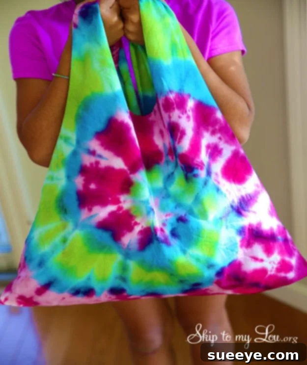 Tie dye t-shirt bag craft, creating a unique and reusable accessory DIY tie dye bag for kids, repurposing an old t-shirt into a colorful tote