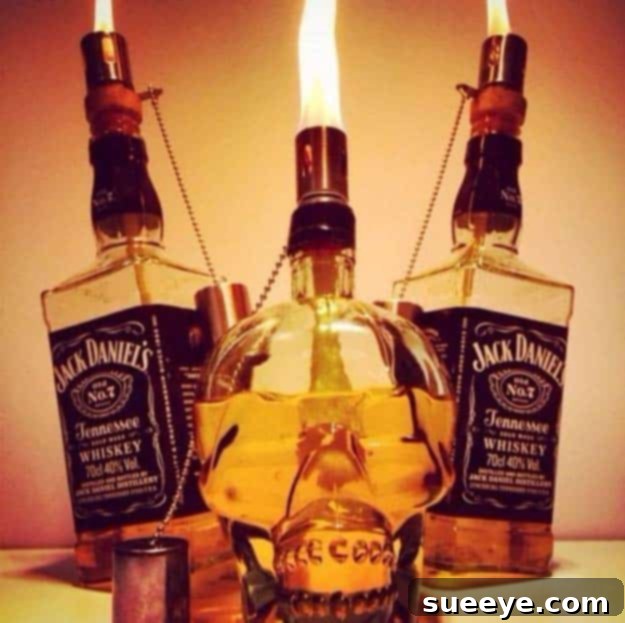 Create DIY Jack Daniel's Tiki Torches: The Perfect Outdoor Lighting for Whiskey Lovers Fun DIY Ideas Made With Jack Daniels - Recipes, Projects and Crafts With The Bottle, Everything From Lamps and Decorations to Fudge and Cupcakes | Tiki Torch from a Bottle of Jack Daniels #diy #jackdaniels #recipes #crafts