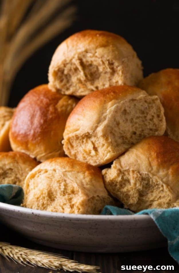 Sweet Honey Whole Wheat Rolls Recipe Basket of soft Honey Whole Wheat Rolls, golden and glazed