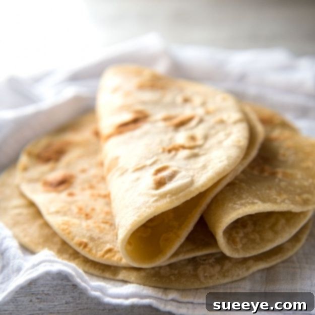 Versatile Easy Soft Flatbread Recipe Pillowy Easy Soft Flatbread, lightly charred and ready to serve