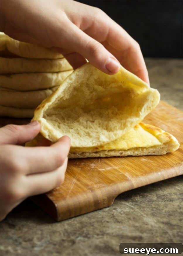 From Dough to Delicious: 50 Homemade Bread and Roll Recipes 2 Freshly baked Homemade Greek Pita Bread, ready for gyros or dips