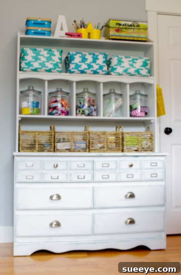 Old Dresser Craft Storage Repurposed old dresser providing ample storage for craft supplies