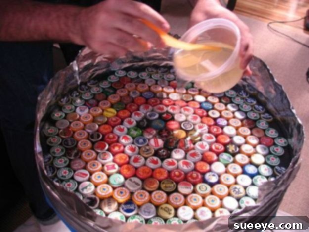 Bottle Cap Table Poured Resin Innovative bottle cap table with a smooth, clear resin surface, perfect for upcycling and creating a conversation piece.
