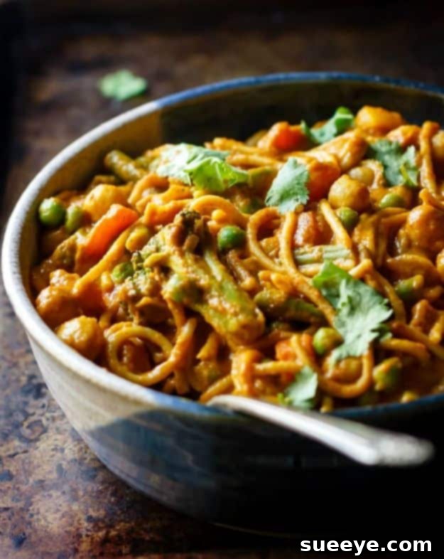 Veggie Noodle Curry Bowls - Vibrant & Nourishing Plant-Based Dish Veggie Noodle Curry Bowls - Healthy Flavorful Vegetarian Meal Idea