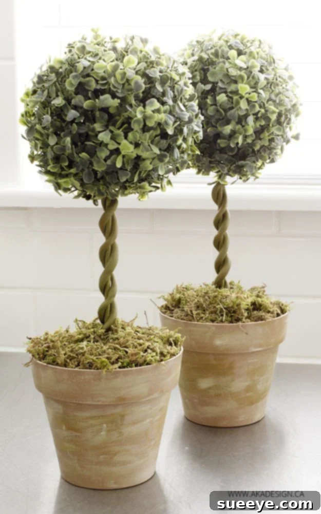 DIY Topiary Trees DIY topiary trees crafted from Dollar Tree floral and pots