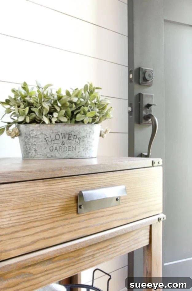 DIY aged galvanized planters made from Dollar Tree buckets