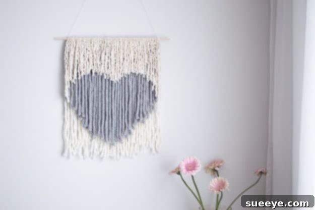 DIY No-Weave Wall Hanging DIY no-weave wall hanging made with Dollar Tree yarn and a stick