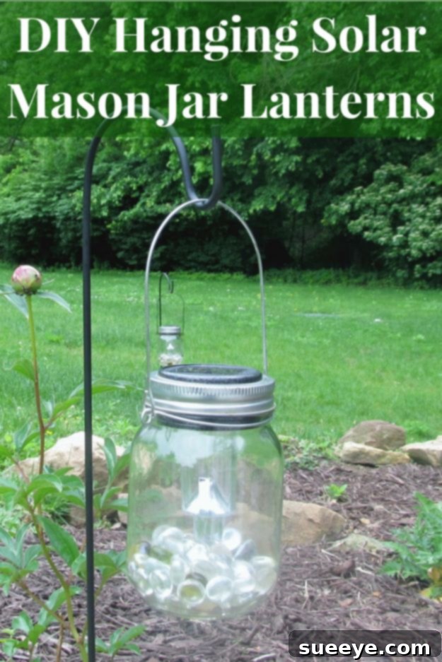 Hanging Solar Mason Jar Lights DIY hanging solar mason jar lights made with Dollar Tree jars and solar lights