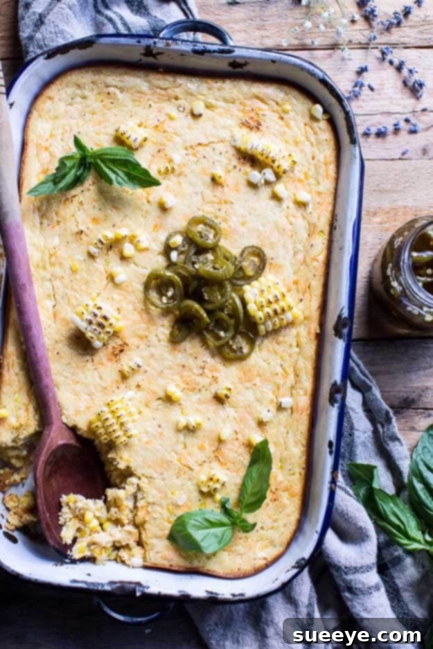 Bourbon Corn Pudding with Spicy Candied Jalapeños 4th of July Recipes Corn Casserole at #fourthofjuly