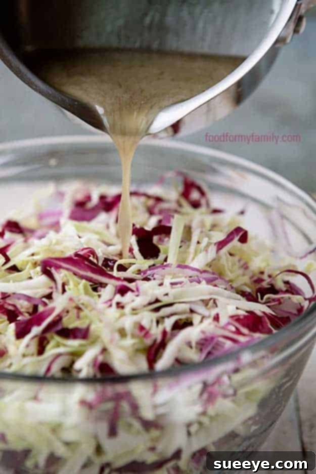 Crisp Tangy Coleslaw for Summer Gatherings 4th of July Recipes Tangy Coleslaw at #fourthofjuly