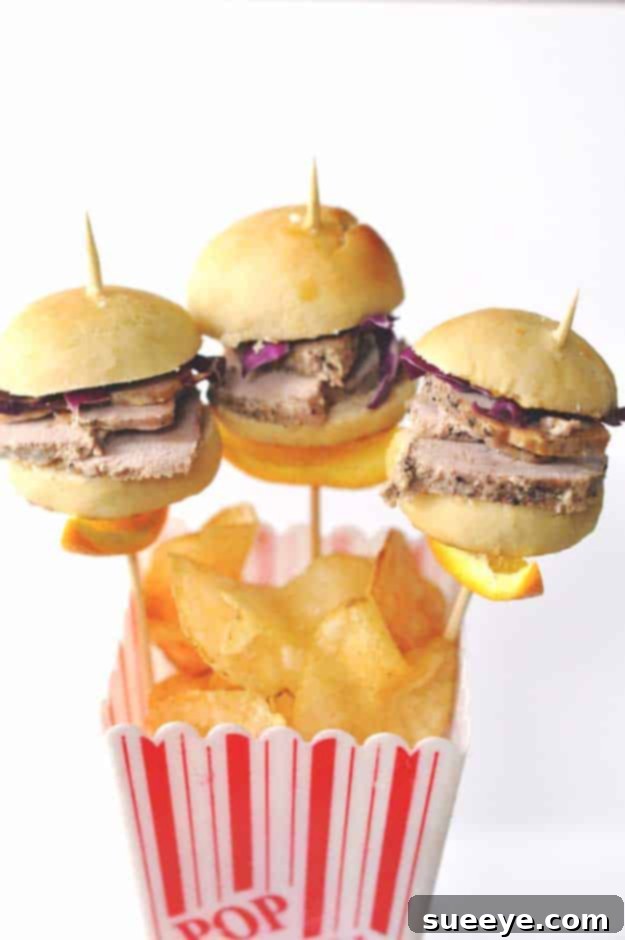 Delicious Orange Pork Sliders for 4th of July Entertaining Best 4th of July Pork Sliders Recipes - Bite-sized, make-ahead Orange Pork Sliders, perfect for party appetizers.